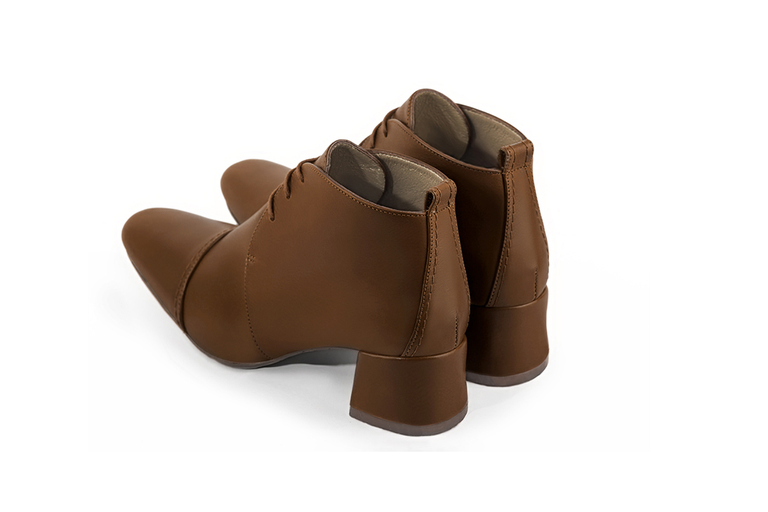 Caramel brown women's ankle boots with laces at the front. Round toe. Low flare heels. Rear view - Florence KOOIJMAN